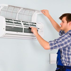 Man repairing air conditioning