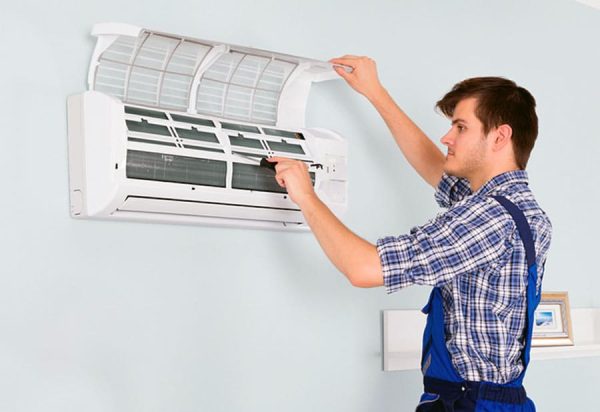 Man repairing air conditioning