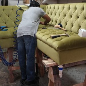 Man repairing Furniture