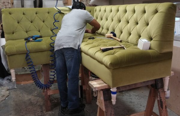 Man repairing Furniture